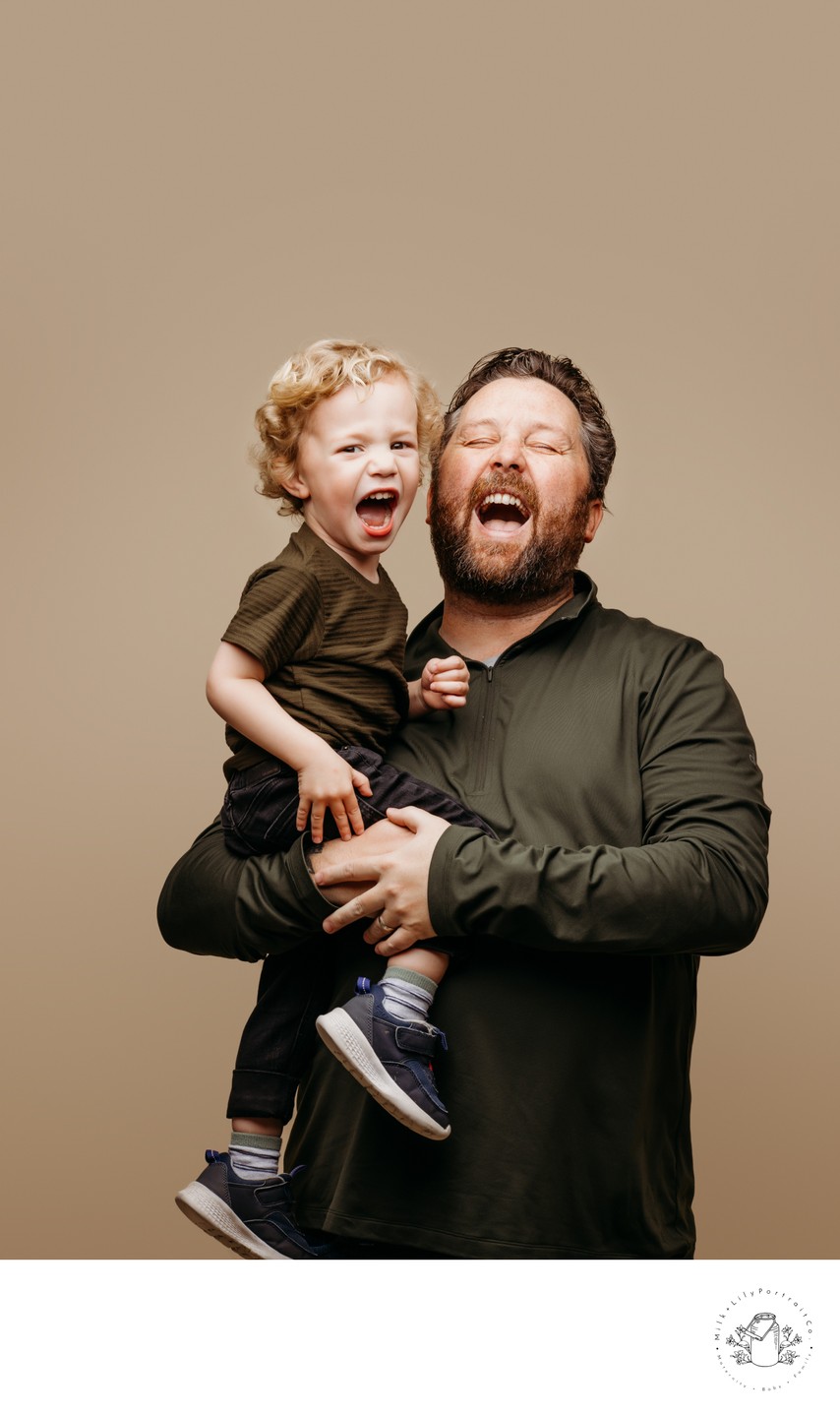 Fun and funny father son portrait