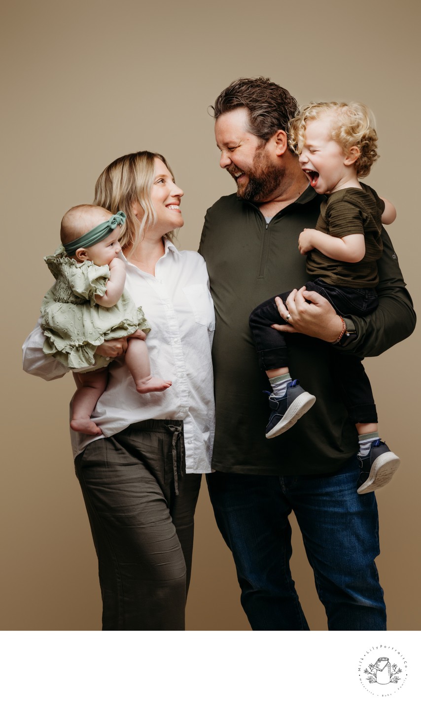 Laughing Family Portrait with Two Kids