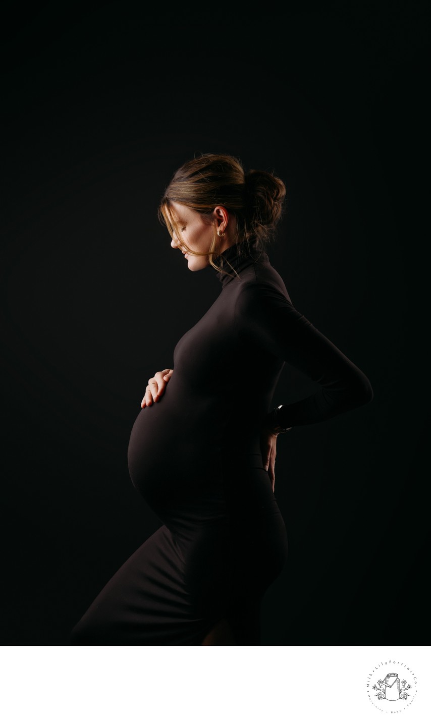 black backdrop maternity photo