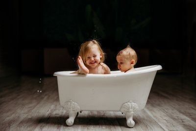 giggles at bath time portrait session