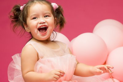 Smiling first birthday photo shoot