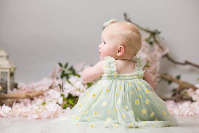 Charming baby portrait with wildflowers