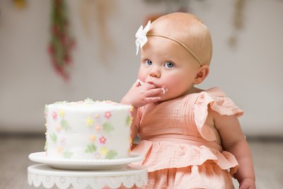 Serene baby portrait with fresh wildflowers