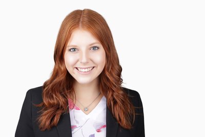 Red headed IT Specialist Headshot