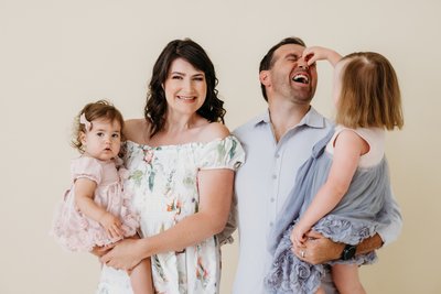 Silly in the studio with mom and dad