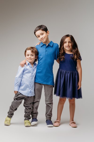 sibling portrait session wearing blue