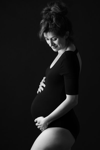 black and white studio maternity portrait