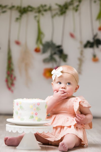 Adorable baby portrait with vibrant wildflowers