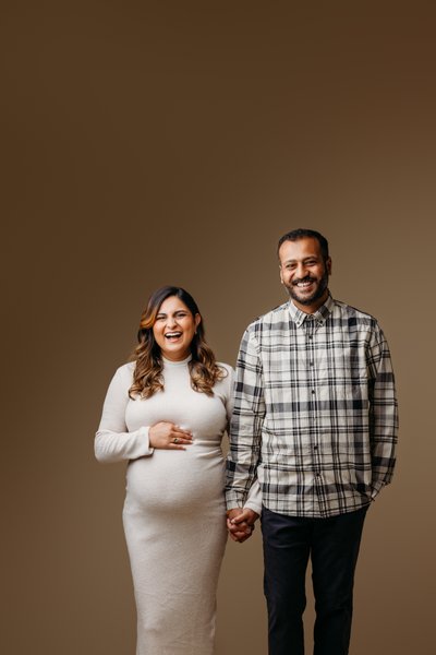 In studio couple's maternity session