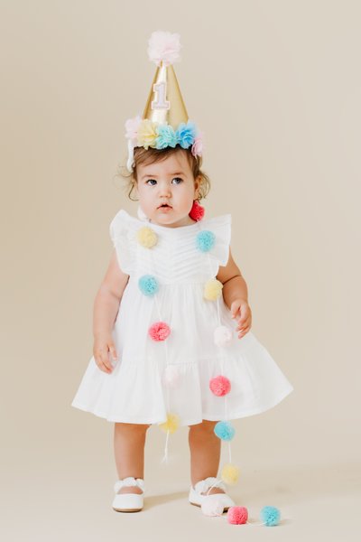 Pom Pom Party princess one year old portrait