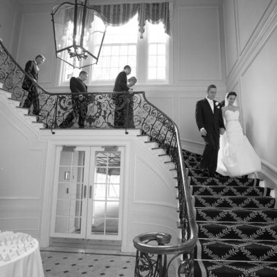 bride and groom descending the stairs at muttontown  cc