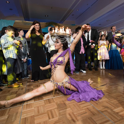 Bar Mitzvah guests entertained by belly dancers