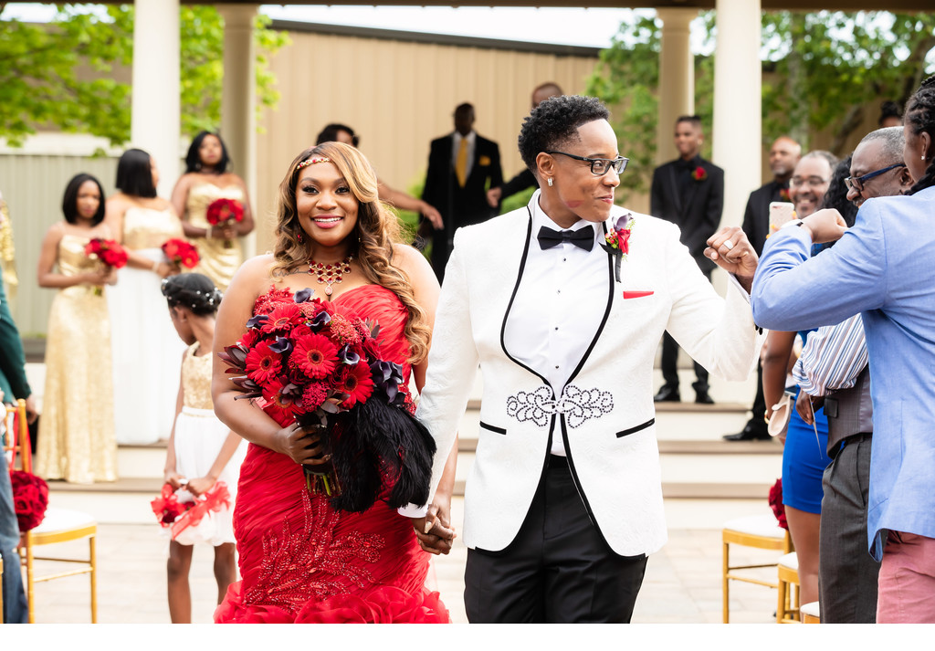 Brides Walk Down Aisle After Same Sex Wedding Ceremony Weddings