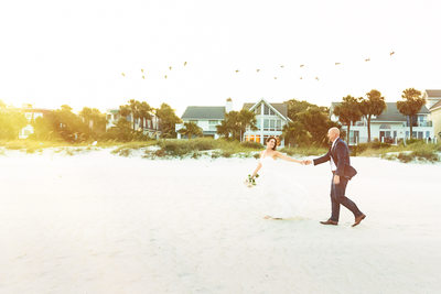 bride and groom on the beach at Sonesta Hilton Head