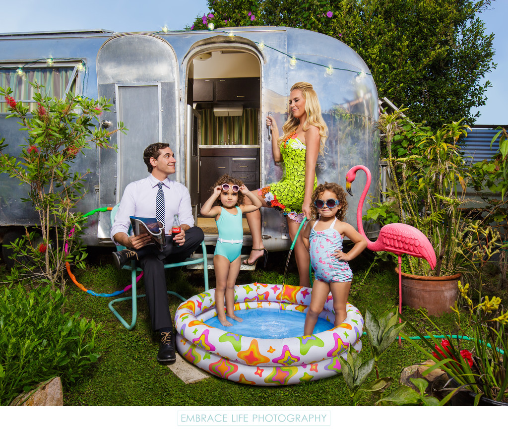 Airstream Family Portrait With Pink Flamingo and Pool