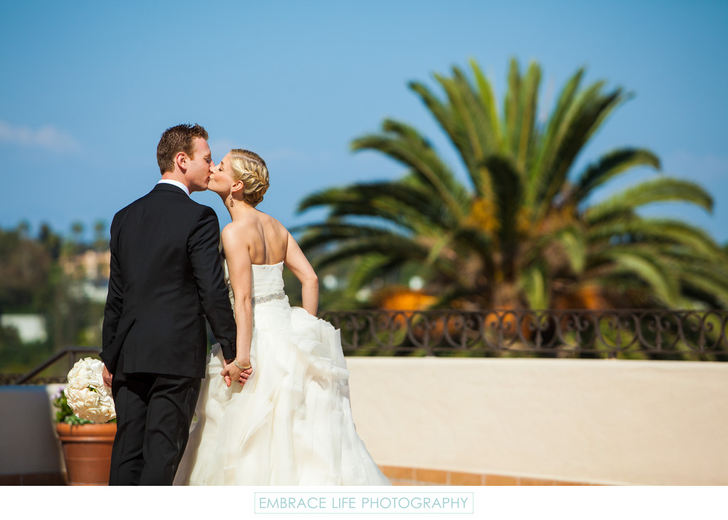 Wedding Couple Kiss with Pacific Palisades Background