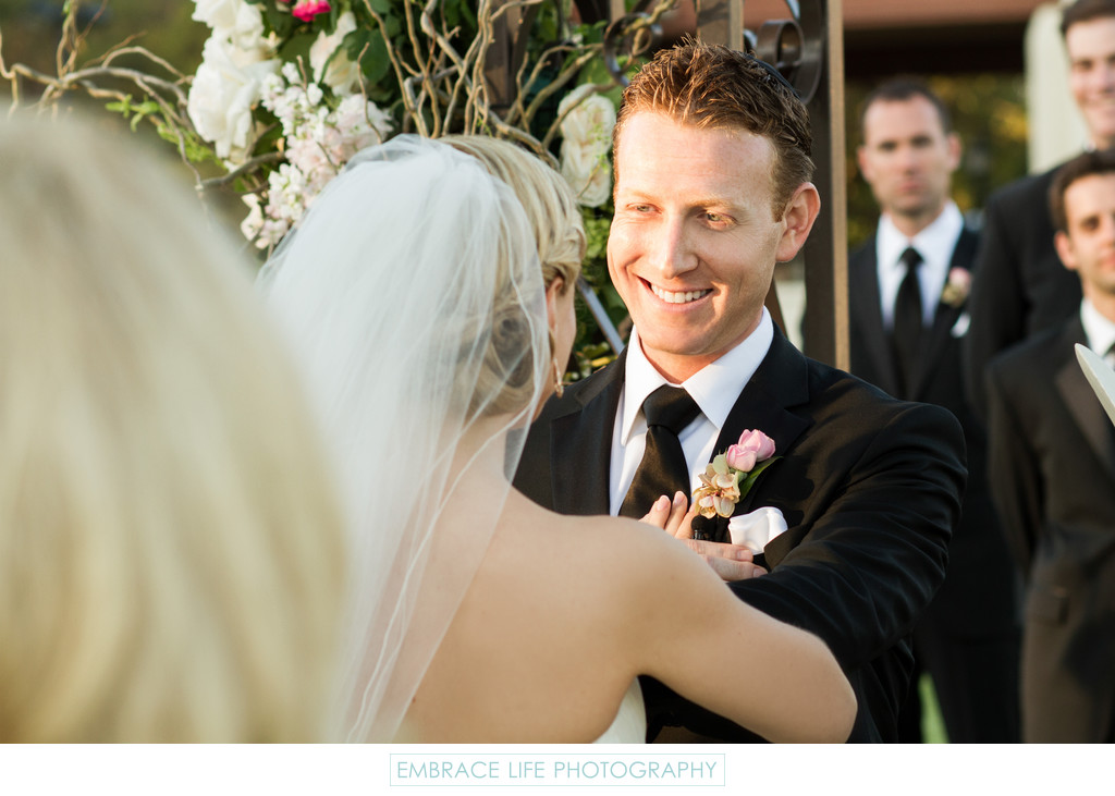 Smiling Groom at Wedding Ceremony