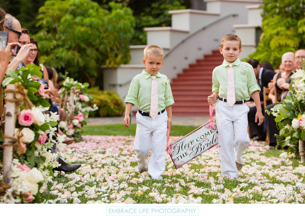 Ring Bearers Holding Rustic Here Comes the Bride Sign
