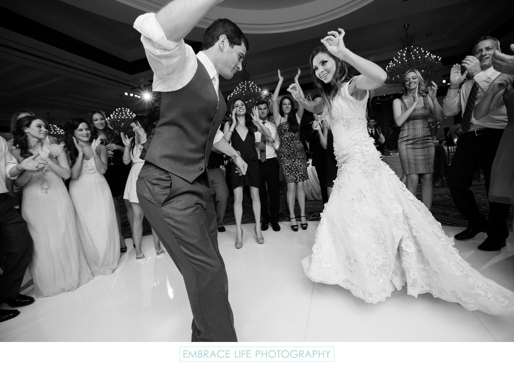 Bride and Groom on their Round White Dancefloor