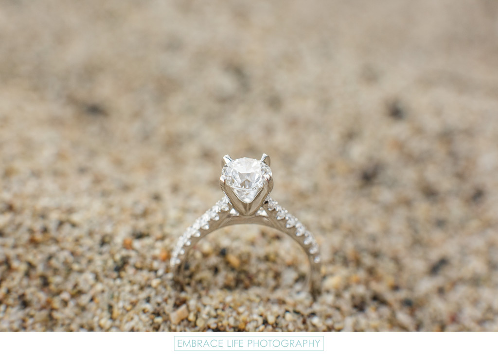 Wedding Engagement Ring in the Sand at Paradise Cove
