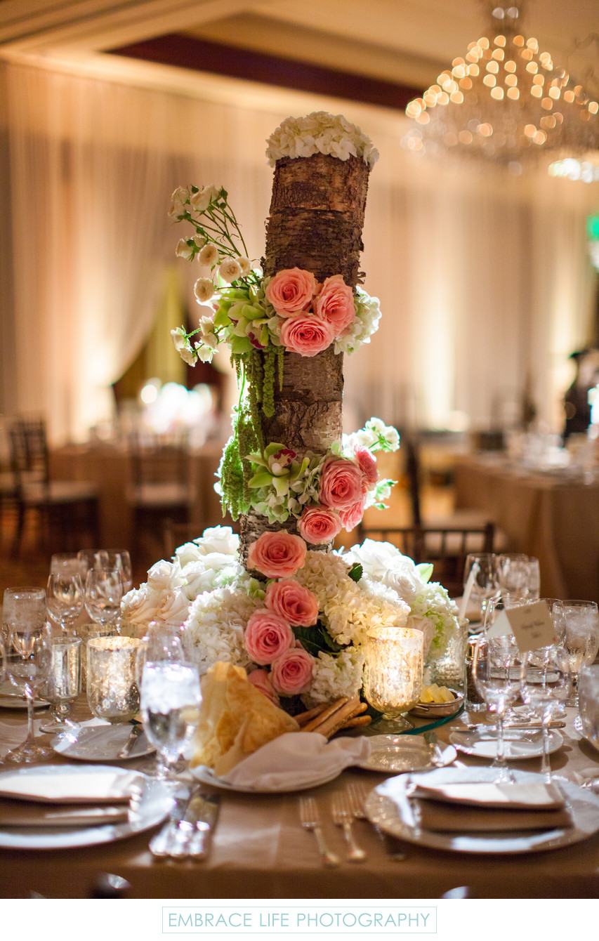Rustic Wood Centerpiece Draped with Flowers