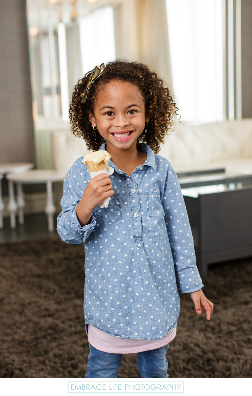 Adorable Girl Holding Ice Cream Cone in Santa Monica