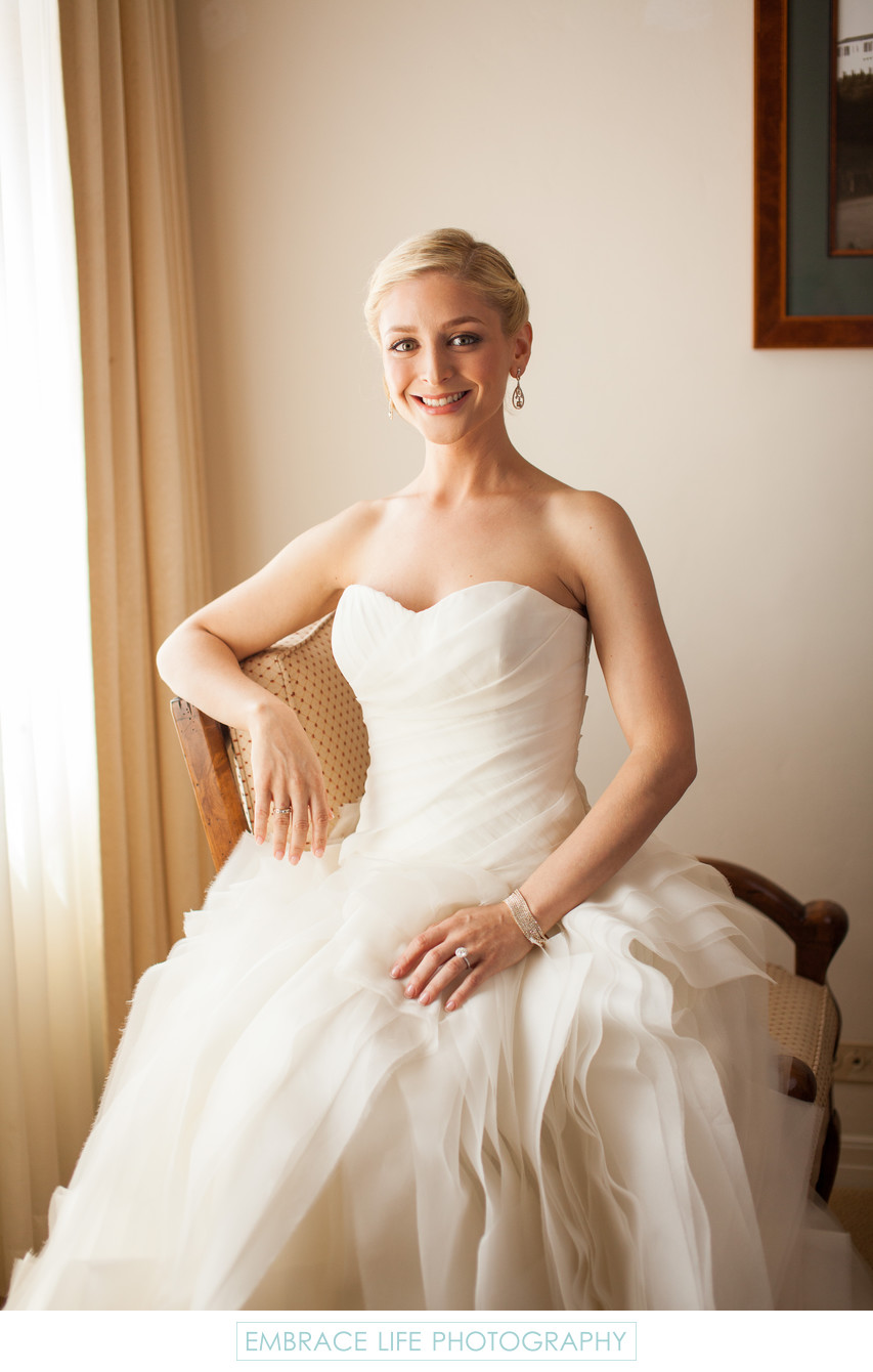 Smiling Bride in Her Ruffled Vera Wang Gown