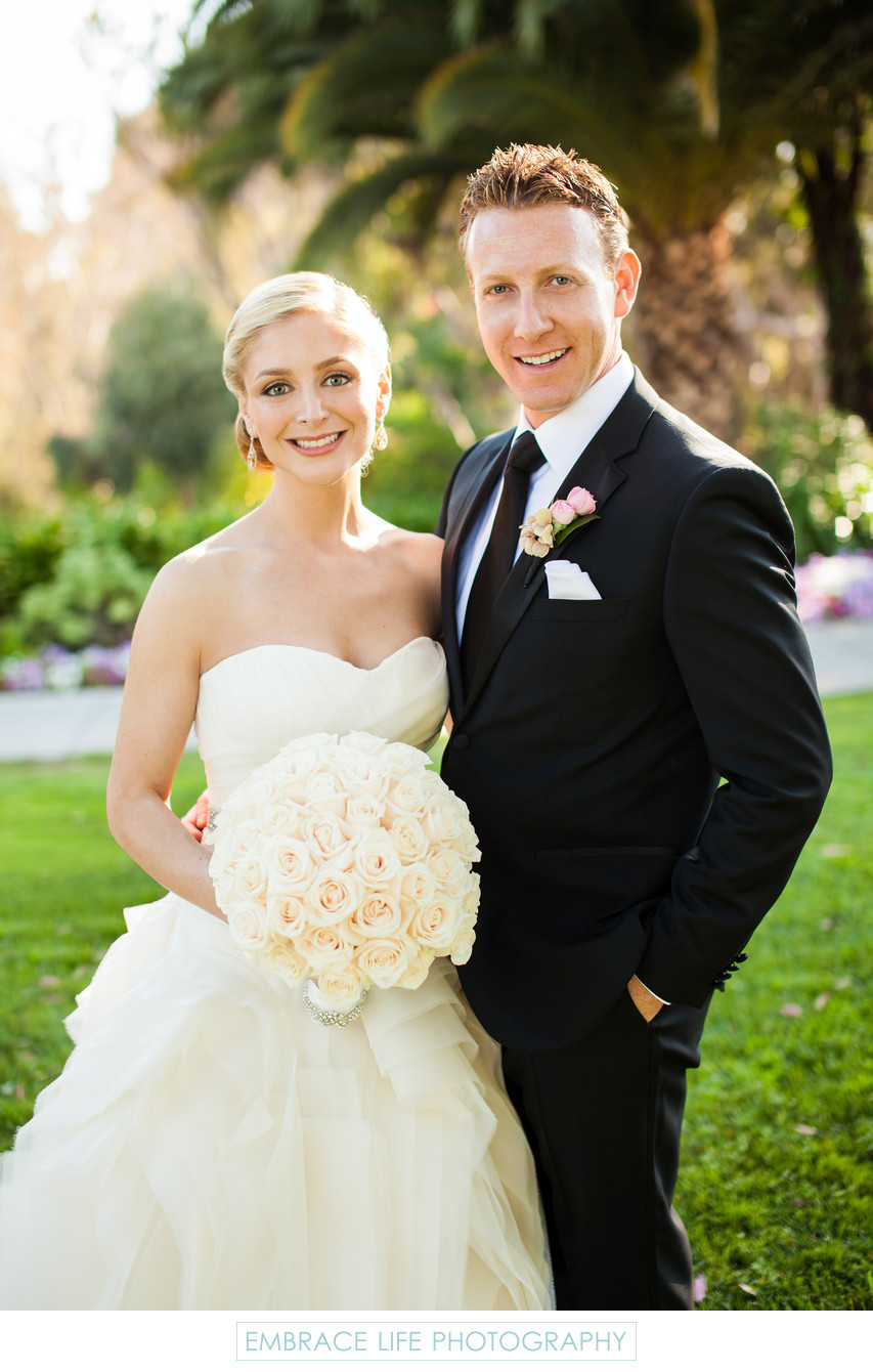 Smiling Bride and Groom Outside Riviera Country Club