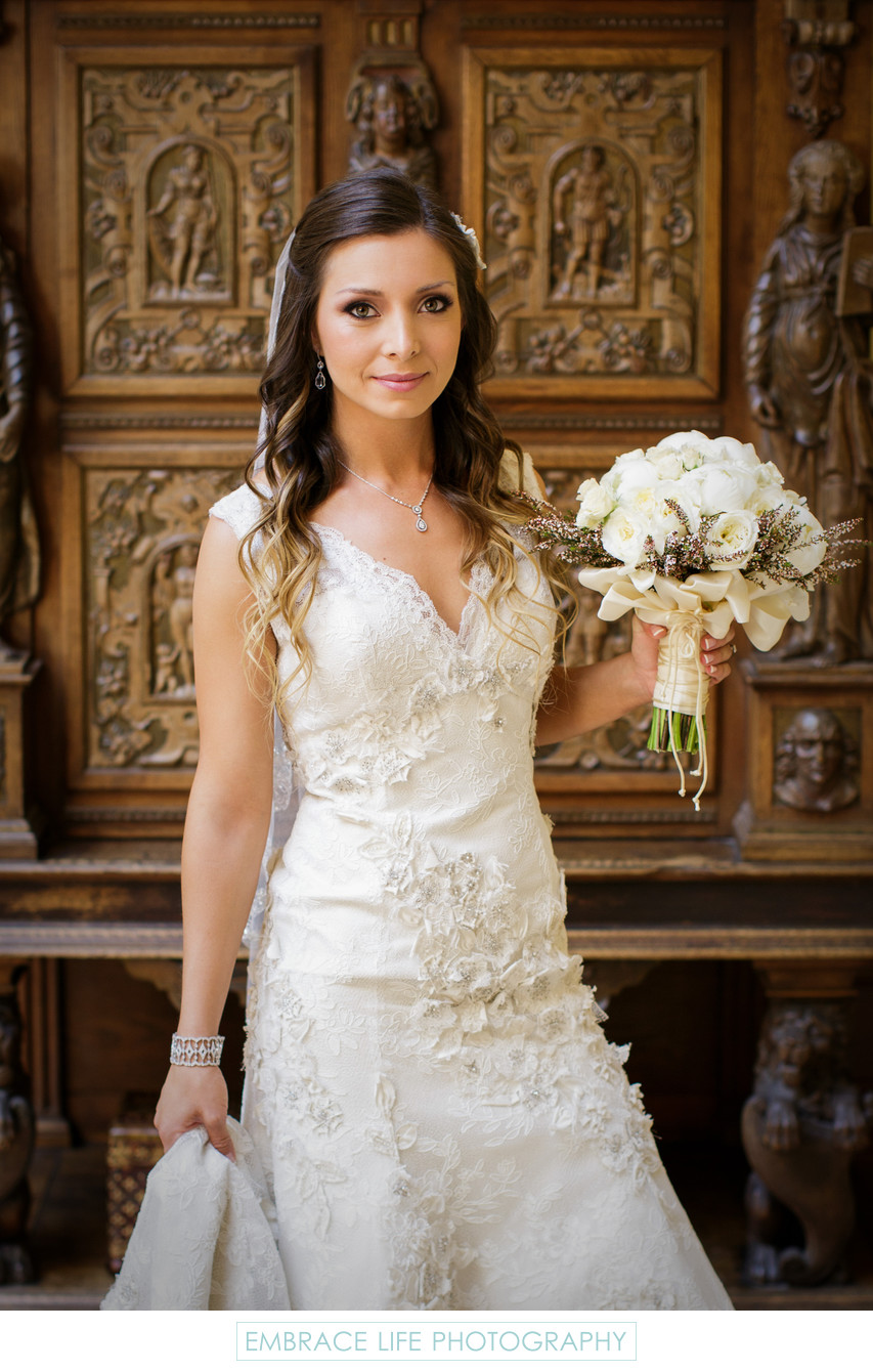 Lovely Bride Holding White Bouquet