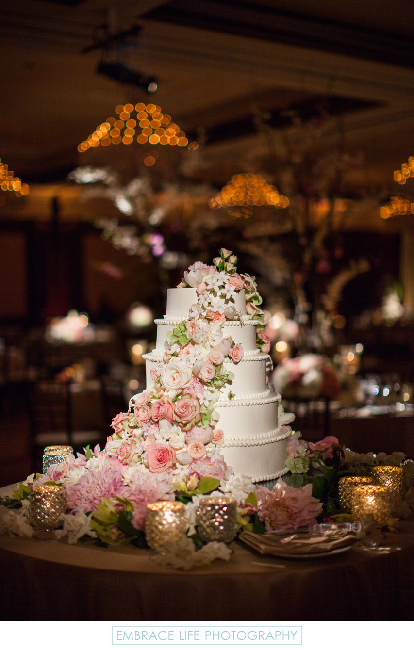 White Five-tiered Wedding Cake with Cascading Roses