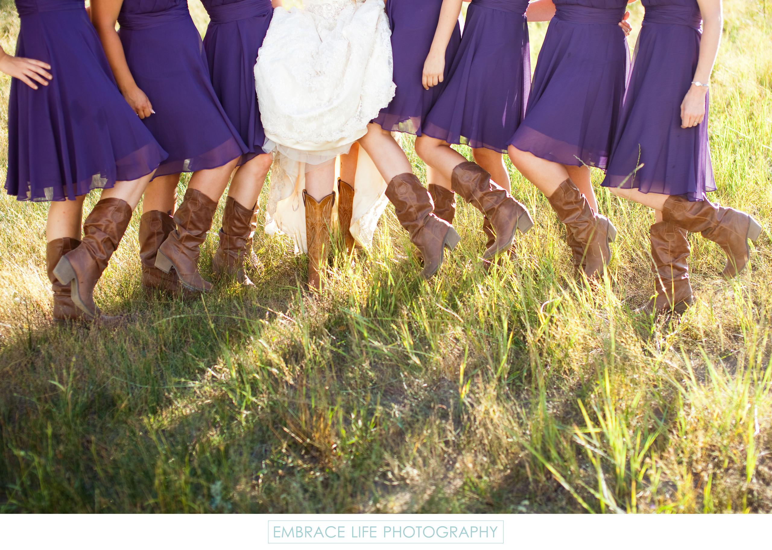 Bride and Bridesmaids Wearing Cowboy Boots Wedding Details
