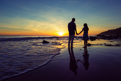Adam and Faith Watching the Sunset on a Malibu Beach