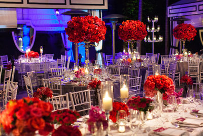 Reception Tables with Candelabra Flower Arrangements