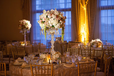 Tall Crystal Candelabra Vases Hold Rose Centerpiece