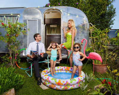 Airstream Family Portrait With Pink Flamingo and Pool