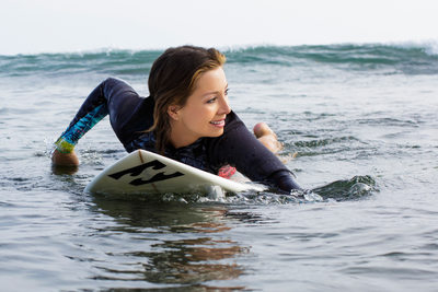 Female Surfer Editorial Photograph in Malibu California