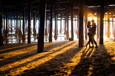 Sunset Engagement Portrait under the Santa Monica Pier