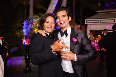 Groom and Best Man Pose at Reception