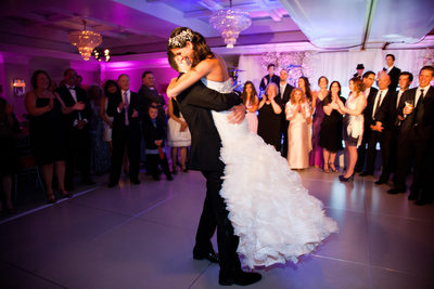 Groom Lifts Bride During First Dance as Husband & Wife