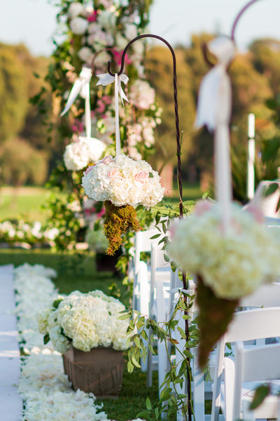 Hanging Floral Bouquets Lining Wedding Aisle