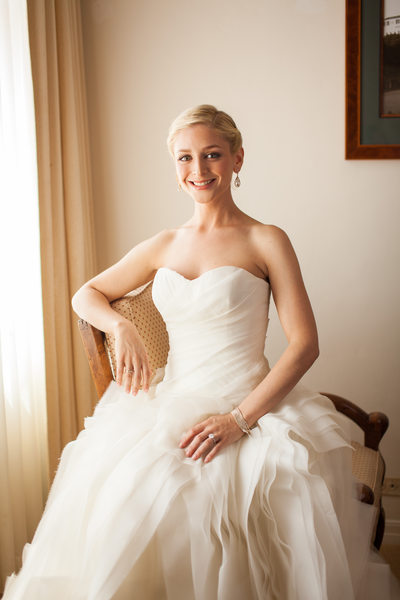 Smiling Bride in Her Ruffled Vera Wang Gown