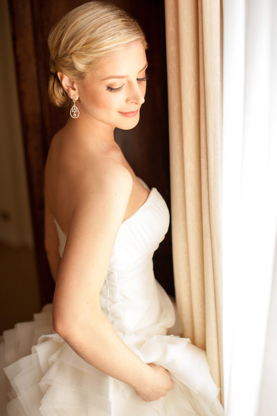 Elegant Bride in Dramatic Over-the-Shoulder Pose