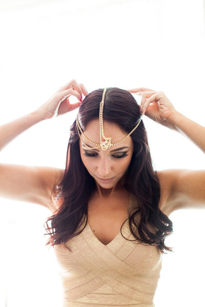 Bridesmaid Putting on Bohemian Hindu Headpiece