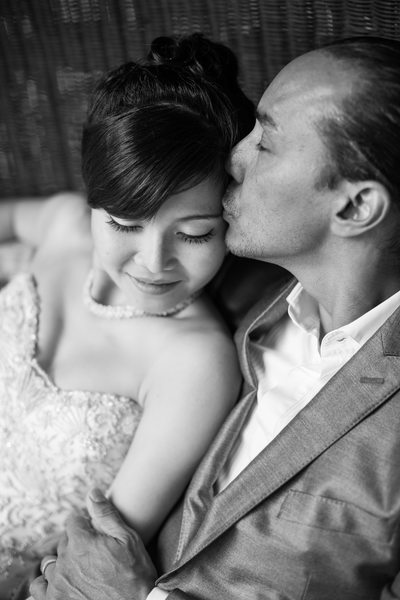 Groom Tenderly Kisses Bride