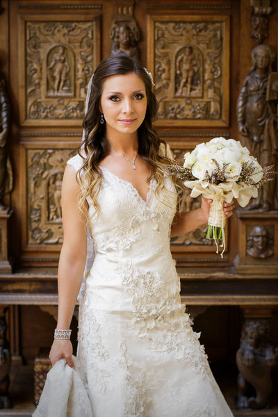 Lovely Bride Holding White Bouquet