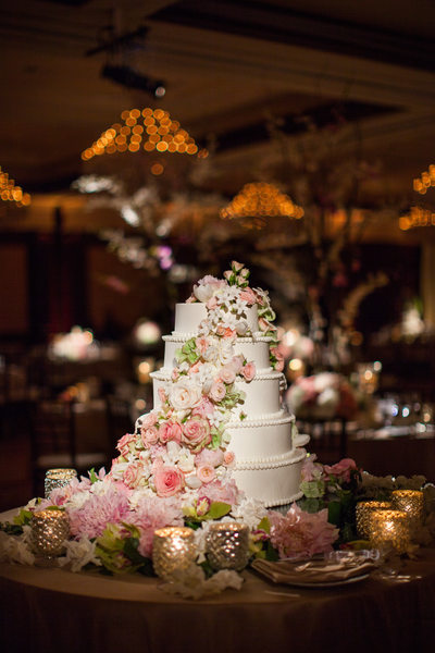 White Five-tiered Wedding Cake with Cascading Roses