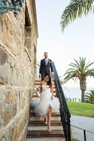 Bride & Groom on Staircase of an Elegant Wedding Venue