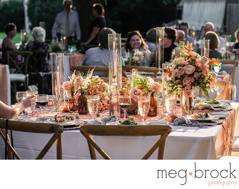 Outdoor Wedding reception with candles and flowers
