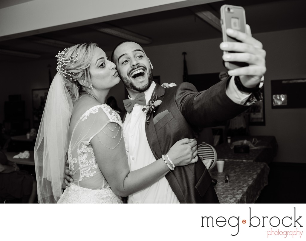 Bride and Brother Take Post Wedding Selfie 