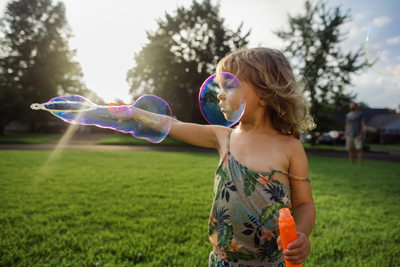 Family Documentary Photography Little Girl Bubbles